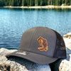 fishing trucker hat with bass fish leather patch.